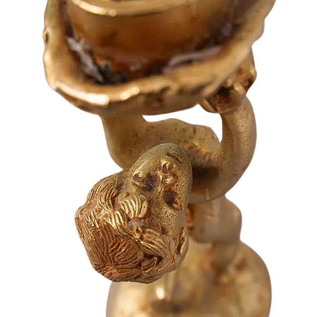 Who says candle holders have to be boring? This whimsical gilt bronze sculpture by Pierre Casenove proves otherwise....