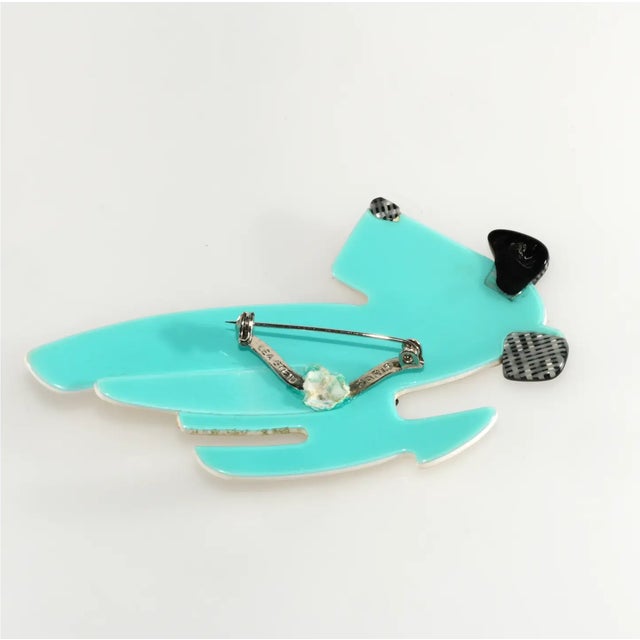 Brooch likely inspired by Ric, one of the dogs in the Ric and Rac cartoon which appeared in a French newspaper in the...