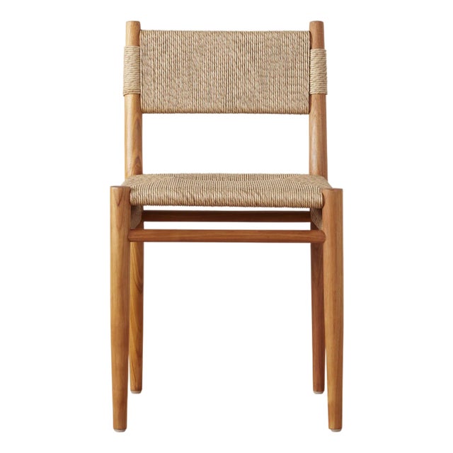 Experience the sophistication of the Alma Indoor/Outdoor Dining chair, made with a slim, tapered teak frame and an...