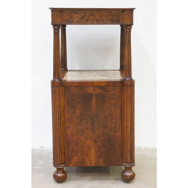 Large walnut bedside table, made in France. Walnut veneer with two shelves, the upper one in wood with inlays, the lower...