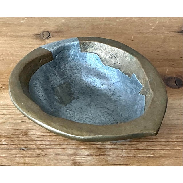 This captivating vintage bowl is a masterclass in bi-metal artistry, realistically rendered in the form of a halved walnut...