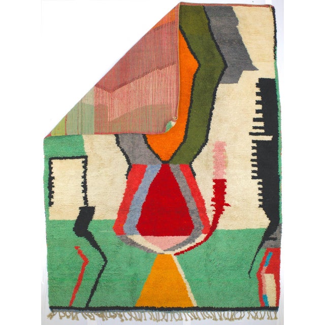 Vintage Moroccan Wool Rug 9’0" x 11’10”. Comprising both the nomadic Berber rugs of the Atlas Mountains, with very thick...