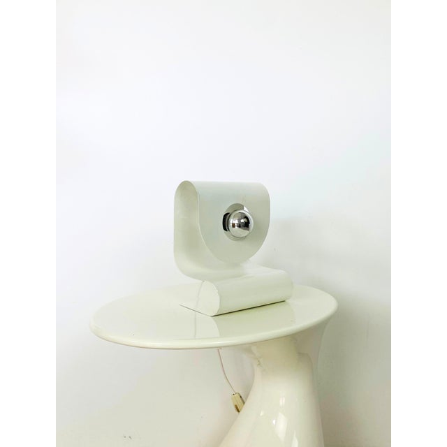 This sculptural table lamp from the 1970s is attributed to Reggiani, the renowned Italian lighting manufacturer known for...