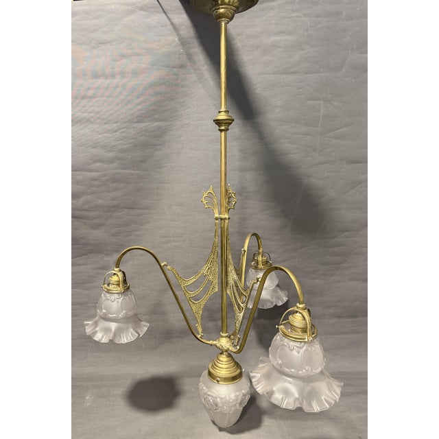 Vintage Art Nouveau ceiling lamp, circa 1910 origin: France openwork structure with stylized plant motifs glass shades...