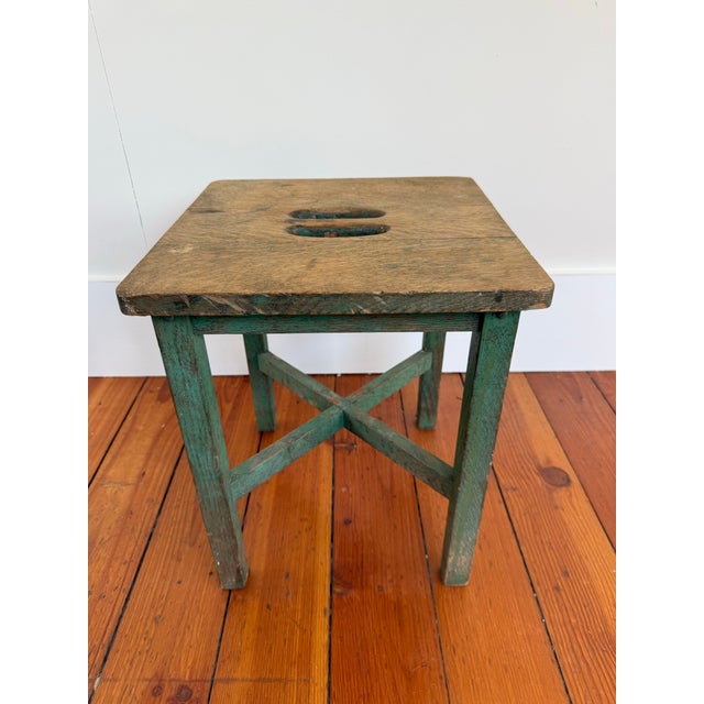 This is a handy vintage oak stool with painted green base. The handle cutout on the top makes it easy to pick up and place...