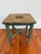 This is a handy vintage oak stool with painted green base. The handle cutout on the top makes it easy to pick up and place...