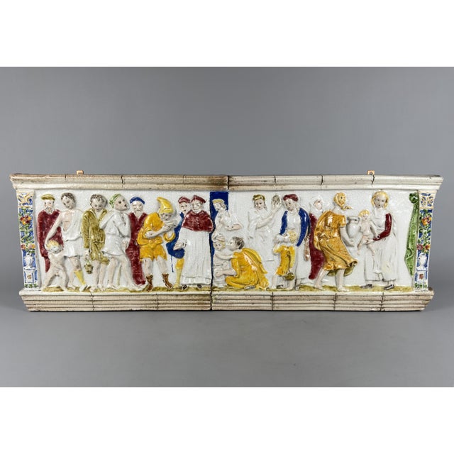 A visually striking and rare work of art. This impressive antique decorative panel combines the mastery of majolica...