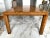 A just gorgeous Mid-Century Hollywood Regency dining table by Mastercraft, in burled wood with brass detailing. This...
