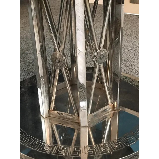 Stunning Modern Neo Classical Nickeled Bronze Tables with Inlaid Various colored Stone.Depicting a Puma resting upon a...