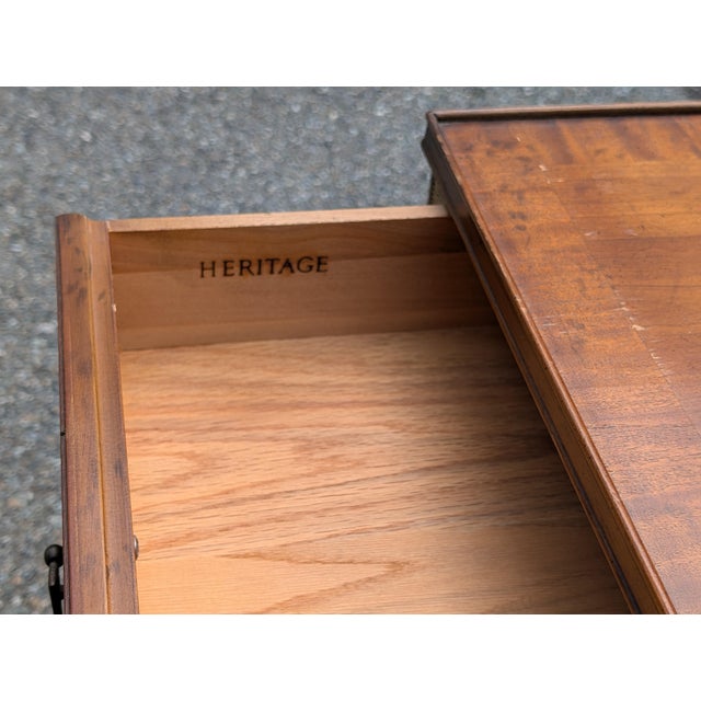 This vintage low-profile end table marries architectural rigor with mid-century elegance. Defined by its dramatic banded...