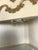Vintage Provincial Neoclassical Gilt Painted Wavy Corner Lighted Vitrine Cabinet For Sale - Image 9 of 9