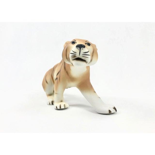 Tiger figurine produced by Royal Dux Bohemia in the 1960s. The condition of the object is very good. This piece has an...