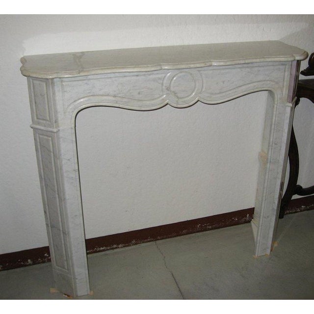 Fireplace Frame in White Marble, Early 1900s, in Very Good conditions. Designed 1890 to 1919