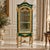 This magnificent French Louis XVI style vitrine features an elegant green finish beautifully accented with lavish gold...