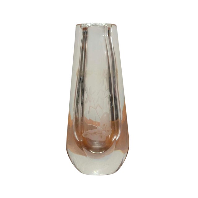 A refined vintage crystal bud vase by Orrefors, Sweden, showcasing the clean lines and exceptional craftsmanship for which...