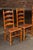 Set of Seven Mid-Century French Country Ladder Back Chairs With Rush Seats For Sale - Image 4 of 9