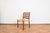 This dining chair was designed in the 1960s by Niels O. Møller for J.L. Møllers. Wooden elements made of solid teak have...