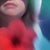 "Fanni" is a captivating contemporary portrait of a girl holding a flower, rendered with a dynamic blur that evokes the...
