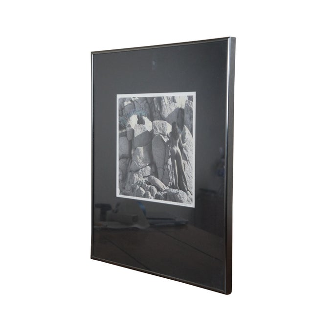 Vintage 1991 photograph by Karen D. Abbott showing the figure of a nude woman with long dark hair and her back to the...