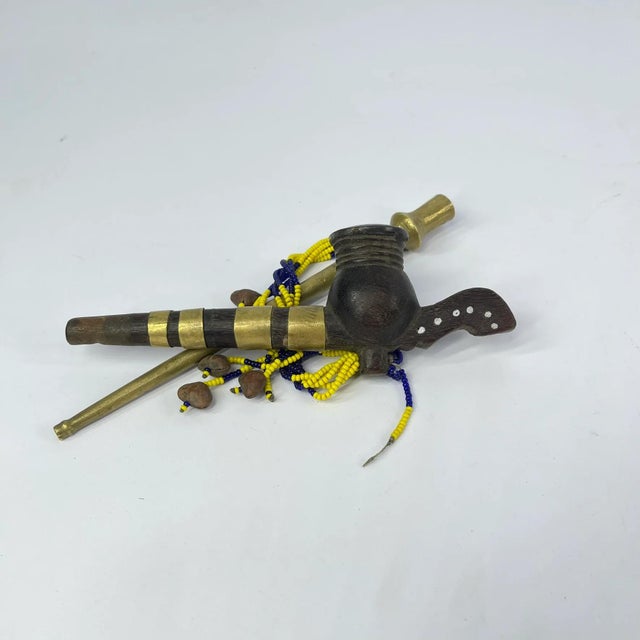 Dinka Smoking Pipe, collapsible and tethered by bead strandsThe Dinka people (Dinka: JiÉÌÉÌÅ) are a Nilotic ethnic...