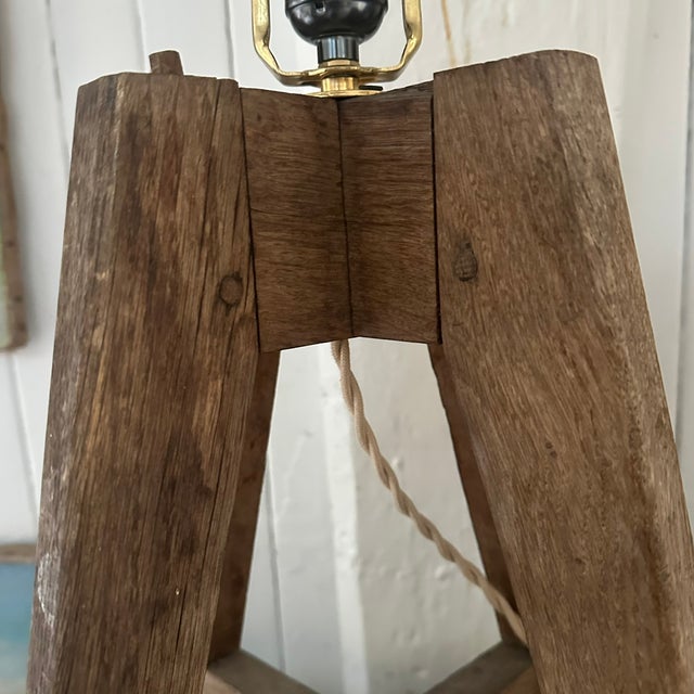 A pair of great looking natural vintage oak French table lamps, recently converted by professional electrician to DL USA...