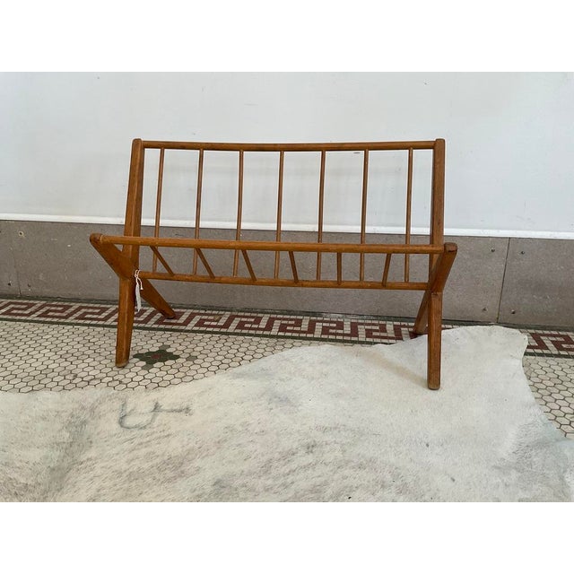 Organize your reading material in style with this exceptional mid-century modern wooden rack. Designed with the clean...