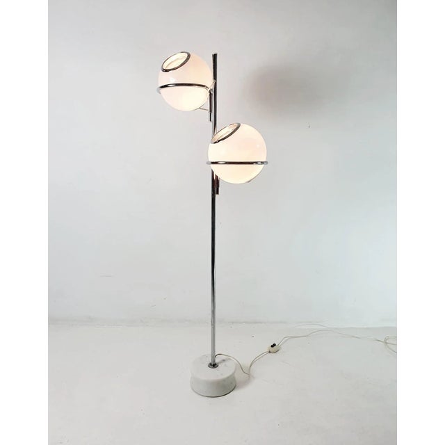 This is an original model 1094 floor lamp by Gino Sarfatti (1912-1985) which was designed for Arteluce in 1969. It...