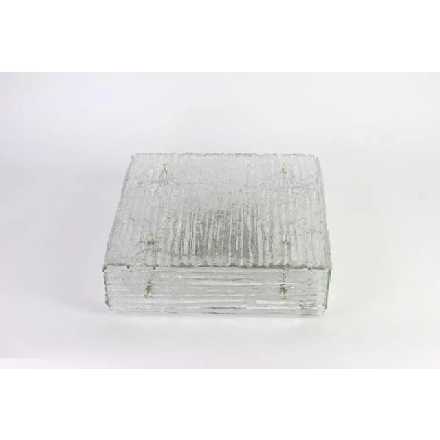 A stunning huge flush mount by kalmar, austria, manufactured in the 1960s. The flush mount is composed of a five thick...