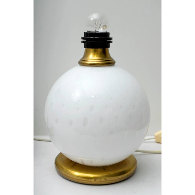 This pair of lamps has been created by Murano Masters, with the technique of blown glass with bubbles of air, the two...