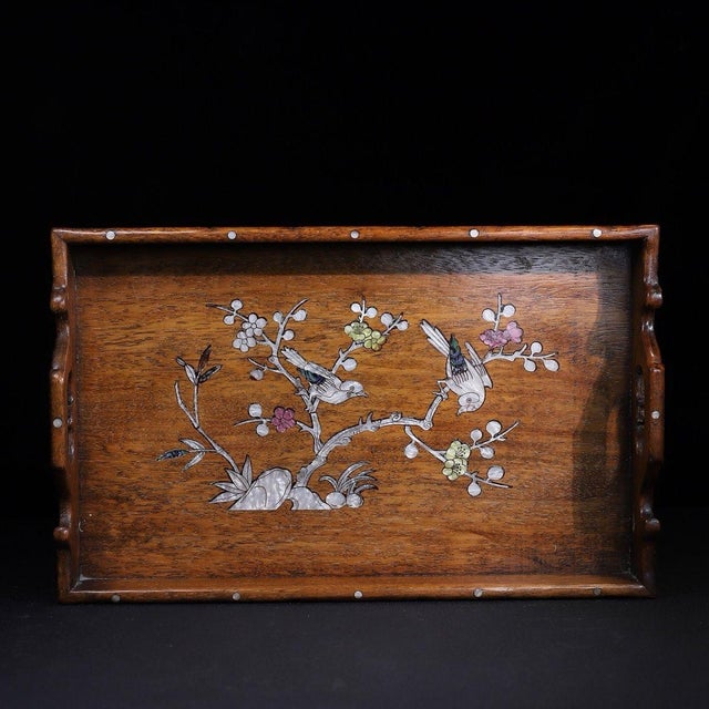 A beautifully crafted Chinese rectangular tea tray or display stand, likely made of Huali (rosewood). The tray features a...