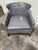 Amazing grey leather club chair with nailhead detail. Leather has a gloss finish. Ironies produces some of the highest...