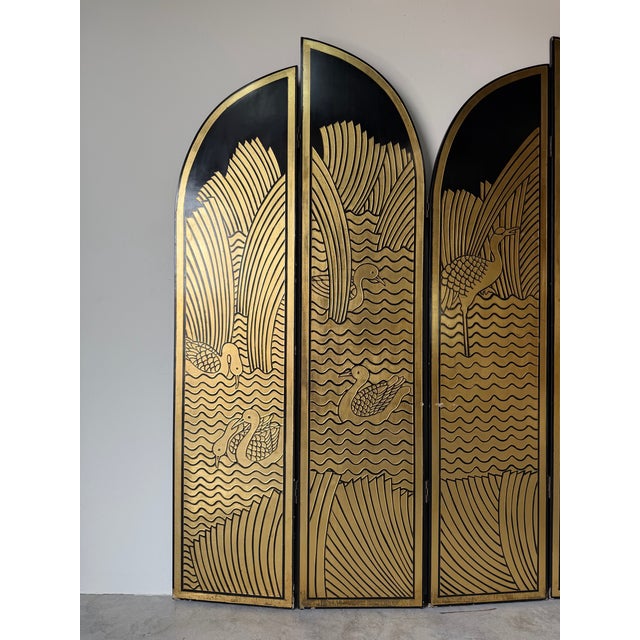 Striking vintage four-panel folding room divider featuring a bold Art Deco interpretation of Asian-inspired design. The...