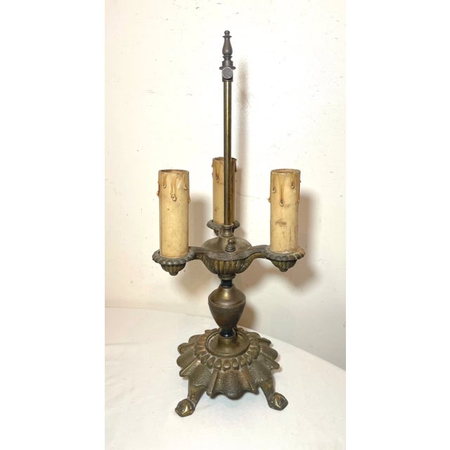 Up for sale is a very nice quality antique Art Deco cast iron candelabra style table lamp. It's beautifully cast out of...