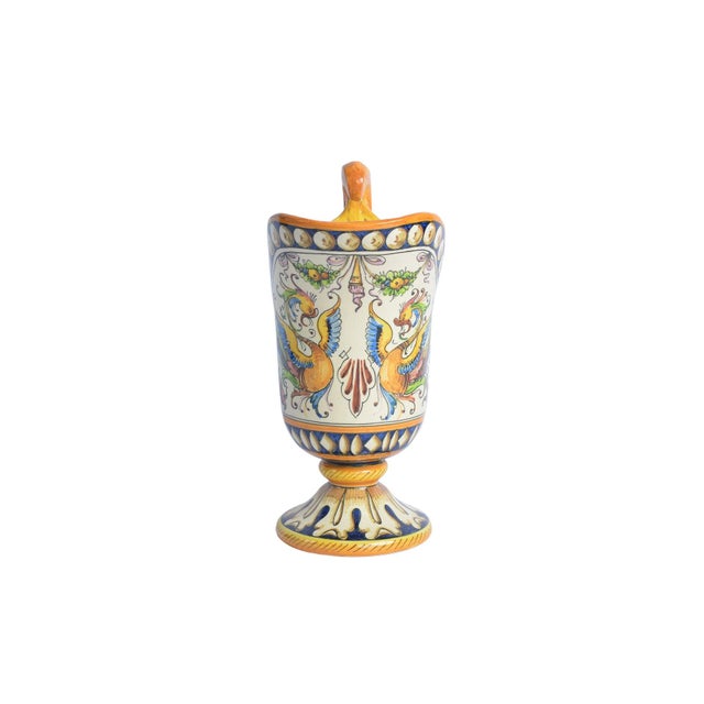 Experience the allure of bygone eras with our Antique Portugal Italian Ceramic Large Faience Serving Pitcher, adorned with...