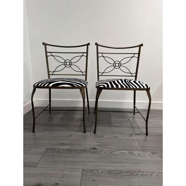 An amazing pair of occasional chairs designed by the acclaimed architect and designer Rene Prou exclusively for the world...