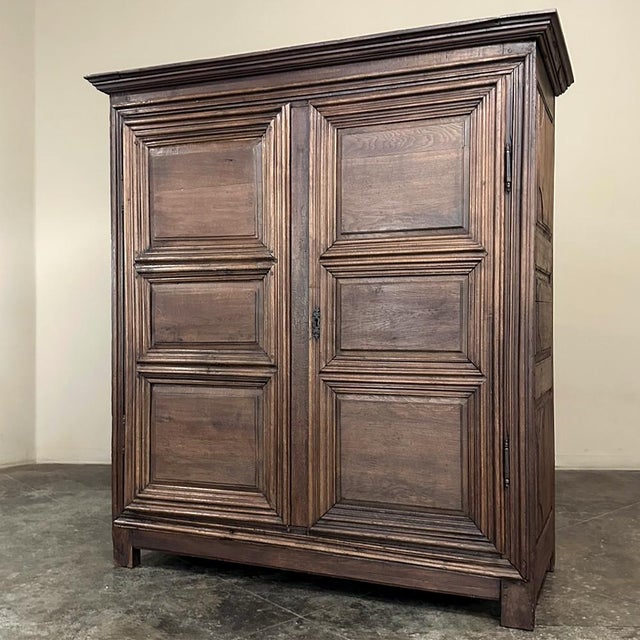 18th Century Rustic Country French Oak Armoire dates to the reign of Louis XV, and features a rural charm that only...