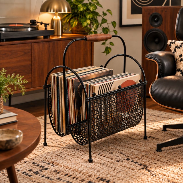1950s Mid-Century Modern Black Steel Double Magazine & Vinyl Record Rack Measurements: 16"W x 18.5"T x 10.75"D (40.64cm x...