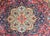 A beautiful early 20th century American Karastan-style rug with a large central floral medallion with even more floral...