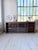 A vintage 1950s pine sideboard with solid oak sliding glass doors. we love the elegance of this piece, with its unique and...