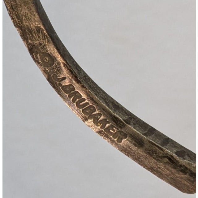 This is exquisite piece of functional metal art by renowned American blacksmith and artist Jack Brubaker. known for his...