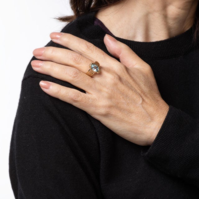 Unique & chic vintage interchangeable ring (circa 1990s), crafted in 10 karat yellow gold. Faceted oval cut amethyst,...