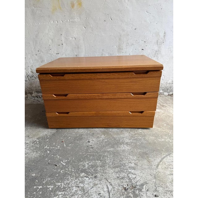Danish Teak Low Chest with Three Drawers – 1970s Minimalist Design Compact and functional, this vintage low chest in teak...