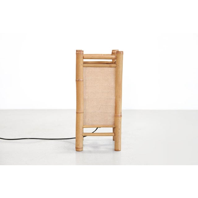 Lovely vintage lamp from Japan, imported by France. The decorative Tarogo lamp is made of bamboo and linen and adds a...