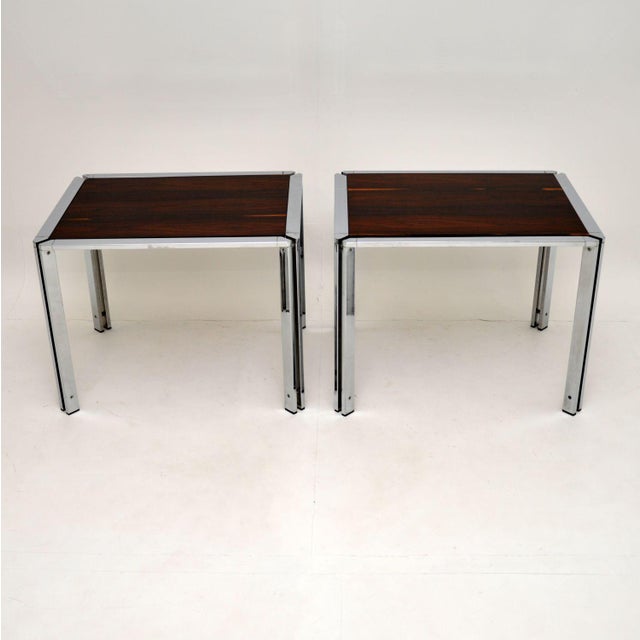 A stunning pair of vintage chrome side tables with inset wooden tops. These were made in Italy, they date from the...