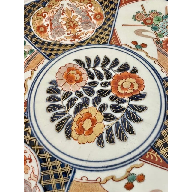 Large antique japanese quality imari charger having lovely hand painted panels in wonderful gold, red, blue, green, yellow...