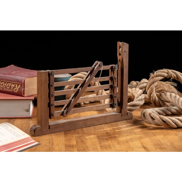 Early 20th-century wooden salesman sample demonstrating a working farm or livestock gate mechanism in miniature. The...