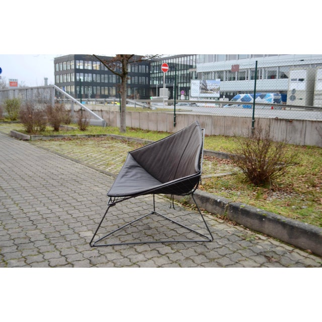 Offered here is the “oti” chair designed by niels gammelgaard for ikea, featuring its original soft pad cushion and...