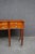 Elegant Maitland-Smith console table crafted in richly figured mahogany with striking satinwood-style banding and chevron-...