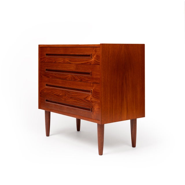 This exquisite piece is an authentic vintage Danish mid-century modern lowboy dresser, a true gem showcasing the stunning...