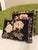 This charming set of vintage pillows are needlepoint. The back is a solid black velvet. Very well made and in nice...